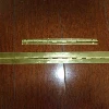 Bisagra de piano de latón pequeña
